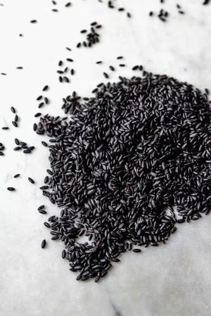 forbidden black rice poured out on the counter