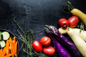 vegetables for ratatouille eggplant, yellow squash, zucchini, Roma tomatoes bell peppers and thyme