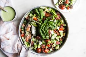 Spring Chop Salad With Asparagus And Peas tomatoes, feta dates and bacon green goddess yogurt dressing