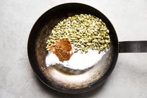 pumpkin seeds, sugar cinnamon in a pan
