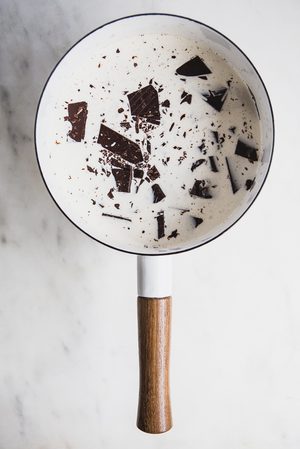 cream and chocolate melting in a pan