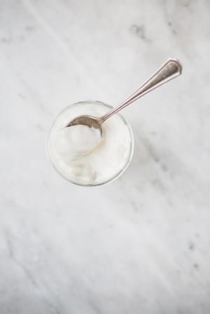 Crème Fraîche in a bowl with a spoon
