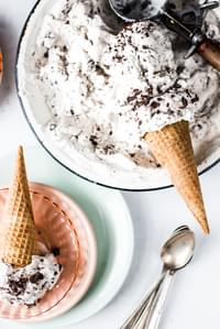 vegan mint chip Ice cream in a cone with a spoon