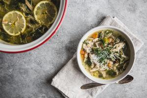 White Bean Chicken Soup in a bowl next to a soup pot