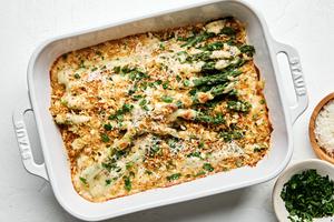 asparagus gratin topped with toasted panko in a casserole dish