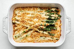 asparagus gratin topped with toasted panko in a casserole dish
