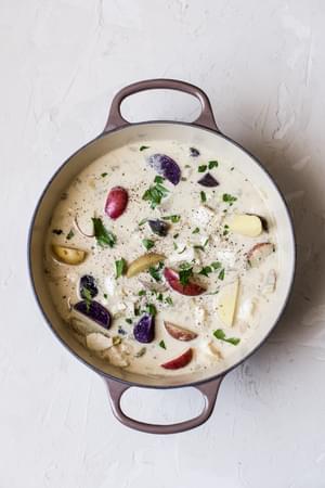 Bourride French Fish Stew with aioli and potatoes in a soup pot