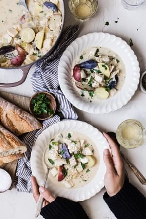 Bourride French Fish Stew with aioli and potatoes in bowls