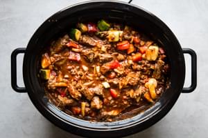 browned chuck roast, ground beef, vegetables, spices, canned tomatoes, and beef stock in a slow cooker to make paleo chili
