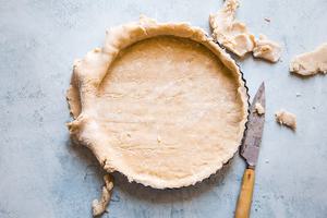 tart crust pressed into a tart pan