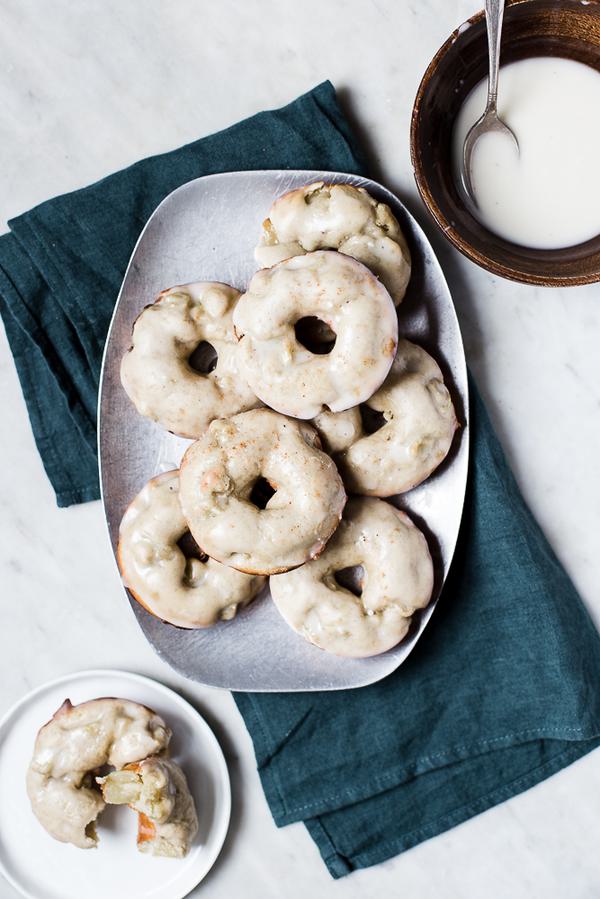 Irish Apple Cake baked Donuts with Whiskey Glaze on a plate with a linen
