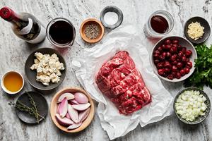 roast, onions, garlic, wine, broth, tart cherries, salt, gorgonzola and parsley in prep bowls
