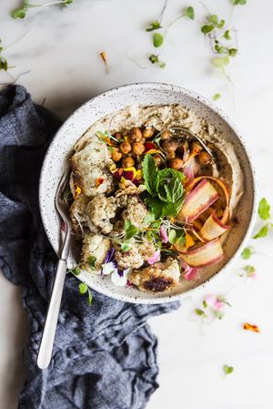 Roasted Cauliflower and Hummus Bowl with carrot ribbons, mint and crispy chickpeas