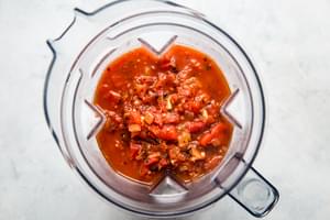 stock, roasted red peppers, fire roasted tomatoes, garlic, spices and onions in a blender for roasted red pepper soup