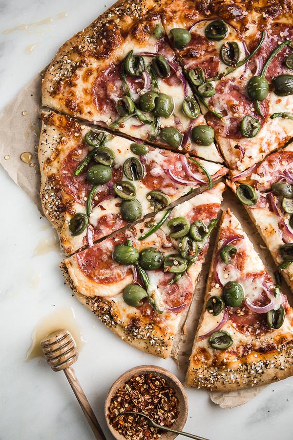 Salami, Jalapeño & Olive Pizza with Honey, jalapeños, red onions and everything bagel crust