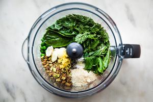 Peas, Pistachios, Parmesan, mint, basil, Cilantro, carrot tops, radish stems, Garlic, Lemon zest and juice and salt