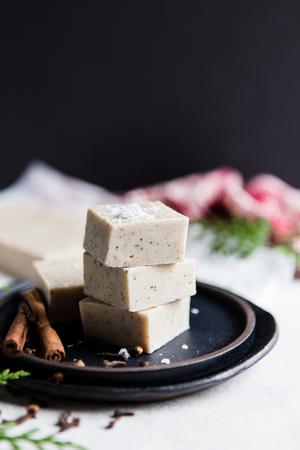 homemade white chocolate chai fudge cut into squares on a plate