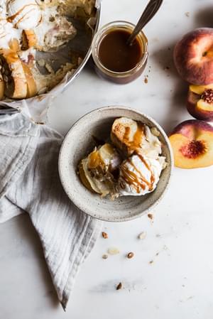 Almond Peach Bread Pudding with ice cream and caramel sauce