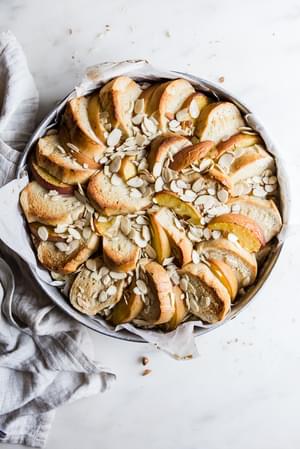 Almond Peach Bread Pudding in a baking dish