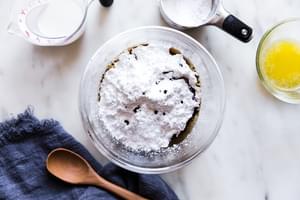 maple cream cheese frosting being made in a bowl
