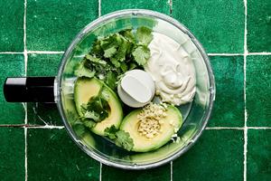 avocado, garlic, sour cream, salt, lime juice and cilantro in a food processor to make avocado crema