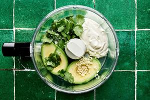 avocado, garlic, sour cream, salt, lime juice and cilantro in a food processor to make avocado crema