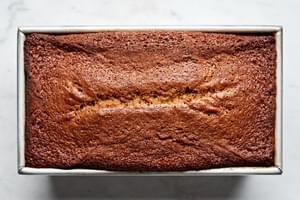 gingerbread loaf spiced with ginger, cloves and cinnamon in a metal baking pan