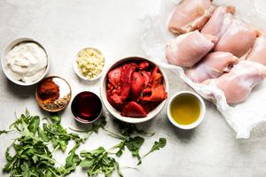 roasted red peppers, mayonnaise, red wine vinegar, garlic, olive oil, spices and boneless skinless chicken thighs