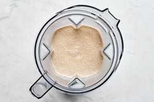 blender of homemade Irish cream liqueur made with condensed milk, whiskey, chocolate, vanilla, coffee, coconut cream & cream