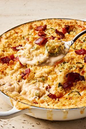 jalapeño popper mac and cheese made with cream cheese, cheddar, pepper jack, bacon and jalapeños, topped with panko