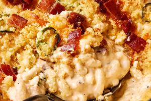jalapeño popper mac and cheese made with cream cheese, cheddar, pepper jack, bacon and jalapeños, topped with panko