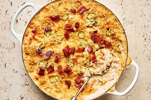 jalapeño popper mac and cheese made with cream cheese, cheddar, pepper jack, bacon and jalapeños, topped with panko
