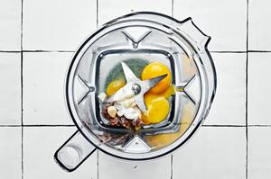 egg yolks, anchovies, garlic, lemon juice and salt in the jar of a blender