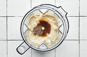 egg yolks, anchovies, garlic, lemon juice, salt, worcestershire and pepper in the jar of a blender