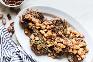 Pecan Crusted Pork Chops With Apple Chutney on a platter