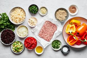ground turkey, quinoa, black beans, cheese, diced tomatoes, avocado, cotija, jalapeño, bell peppers, cilantro