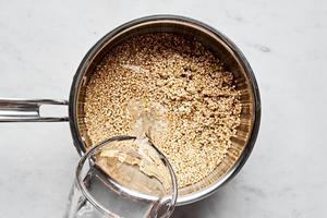 Quinoa being cooked in a sauce pan