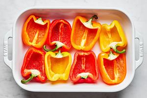 8 bell pepper halves in a baking dish