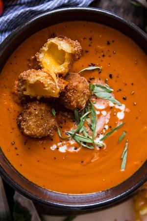 creamy tomato soup with friend cheese