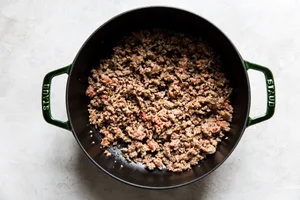 italian sausage browned in a soup pot for tortellini soup
