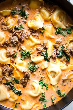a large pot of homemade Tortellini Soup With Italian Sausage And Kale