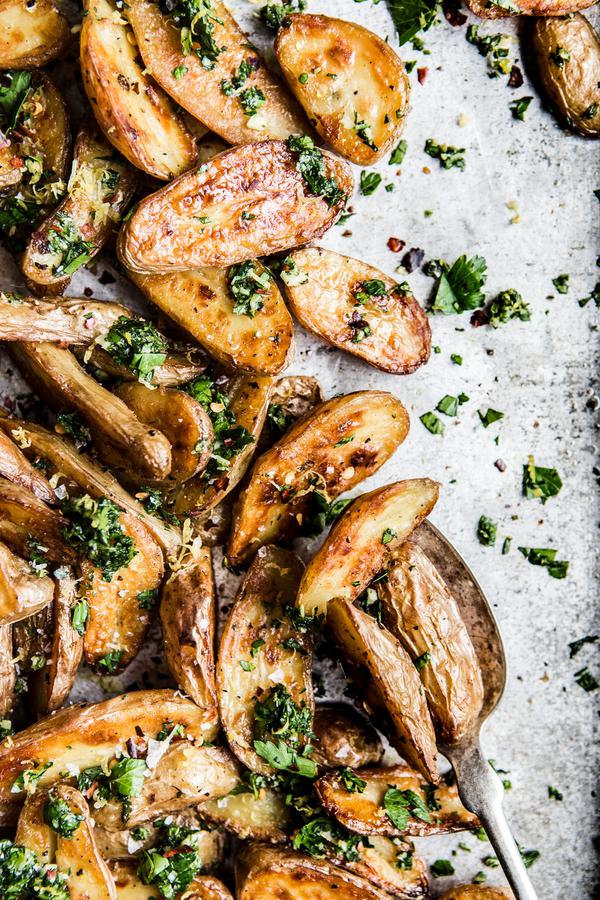 Crispy Roasted Potatoes With Gremolata on a baking sheet