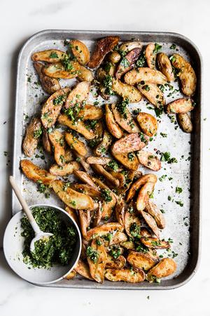 Crispy Roasted Potatoes With Gremolata on a baking sheet
