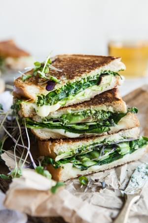 green goddess grilled cheese sandwich with avocado , spinach, asparagus and herbs