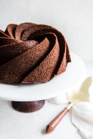Irish Cream Chocolate Bundt Cake on a cake stand
