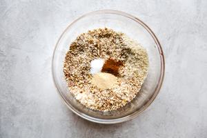 bread crumbs, salt and seasoning and crushed pecans in a bowl