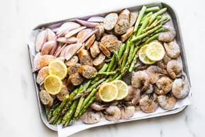 Shrimp and sausage sheet pan dinner with asparagus, shallots and lemon