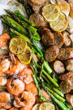 Shrimp And Sausage Sheet Pan Dinner with asparagus and lemon