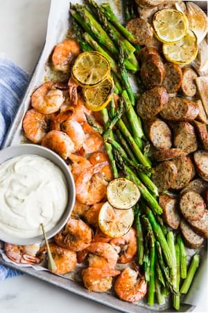 Shrimp And Sausage Sheet Pan Dinner with asparagus and lemon aioli