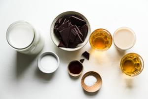 ingredients for spiked hot chocolate in small bowls